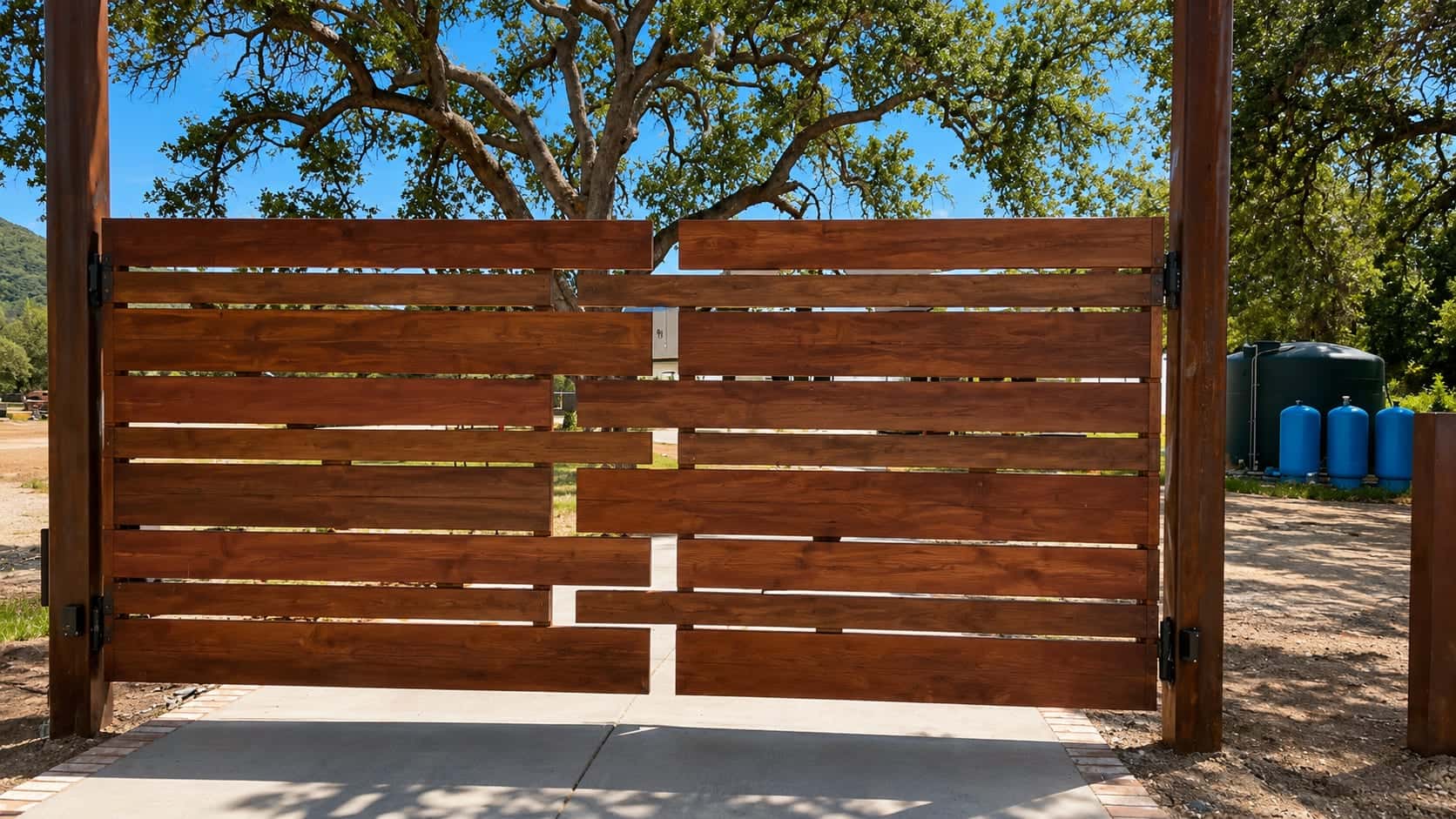 Horizontal wood-and-metal privacy fence panel
