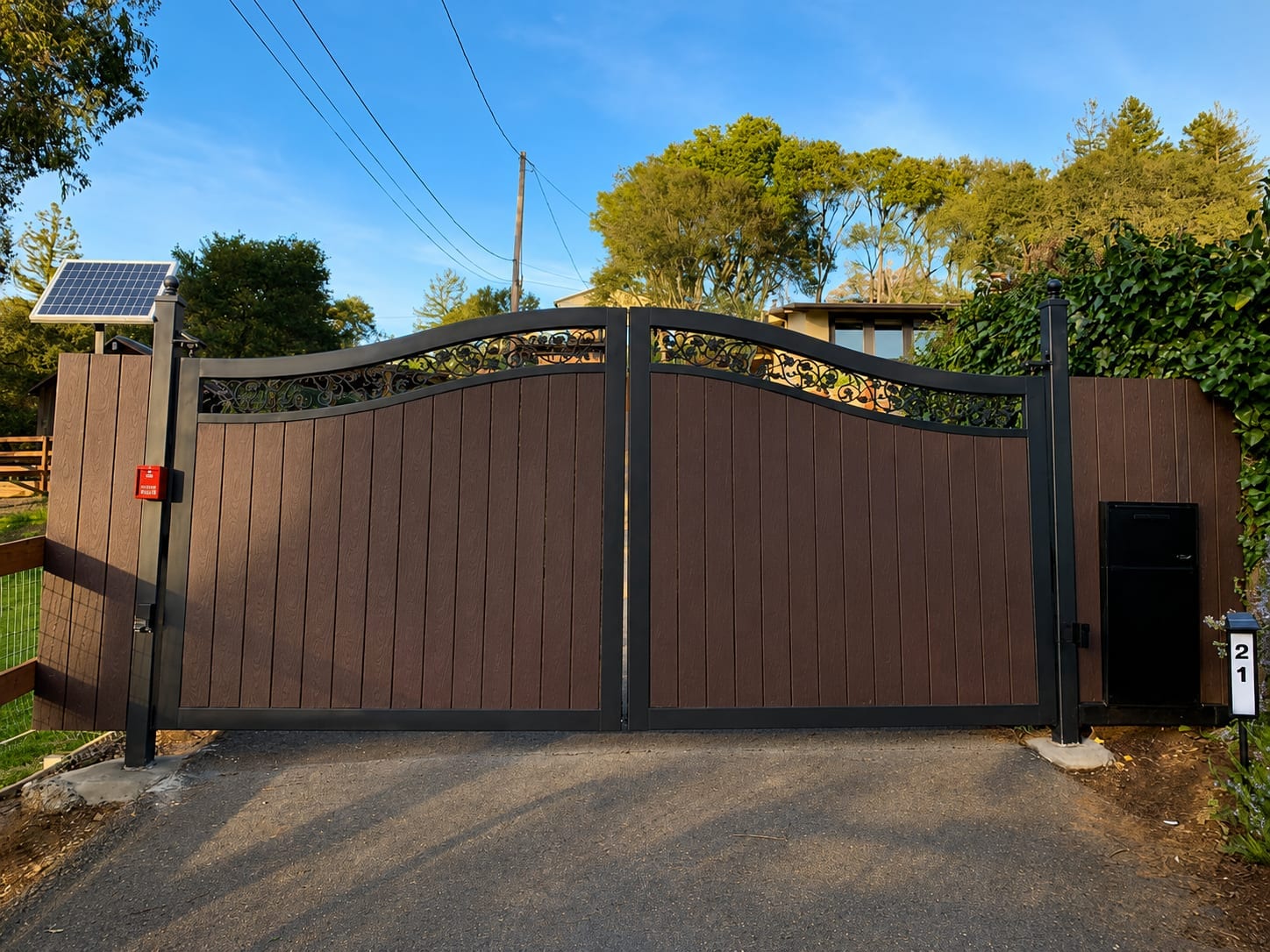 Custom arched double swing gate installed by NGL Automatic Gates