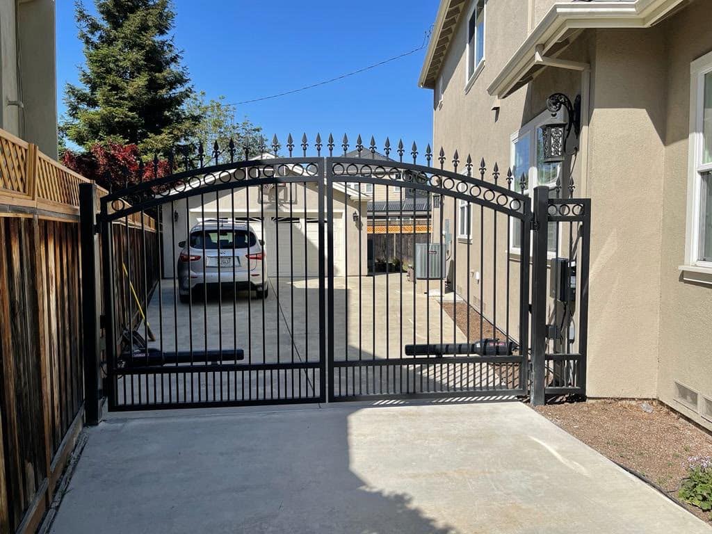 Newly installed ornamental steel driveway gate at a Bay Area home