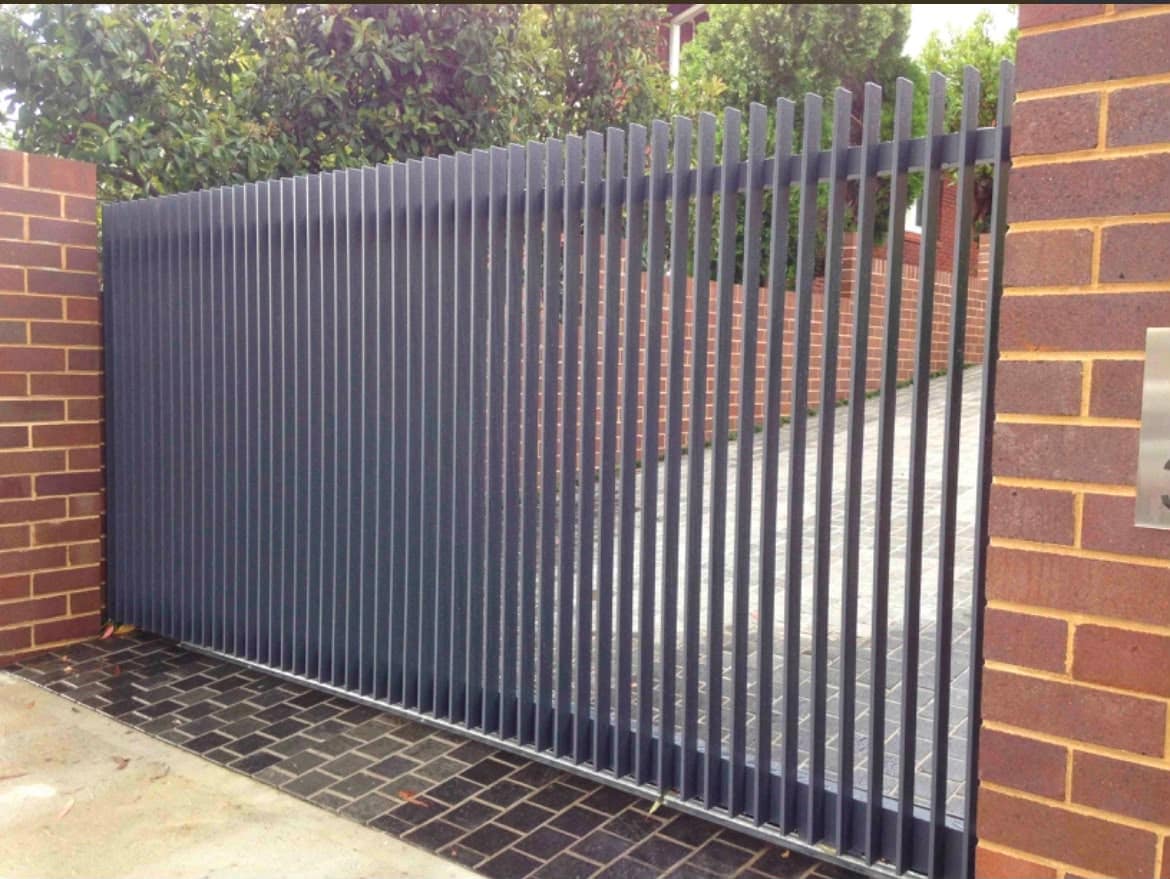 High-cycle commercial slide gate at a South Bay entrance serviced by NGL Automatic Gates
